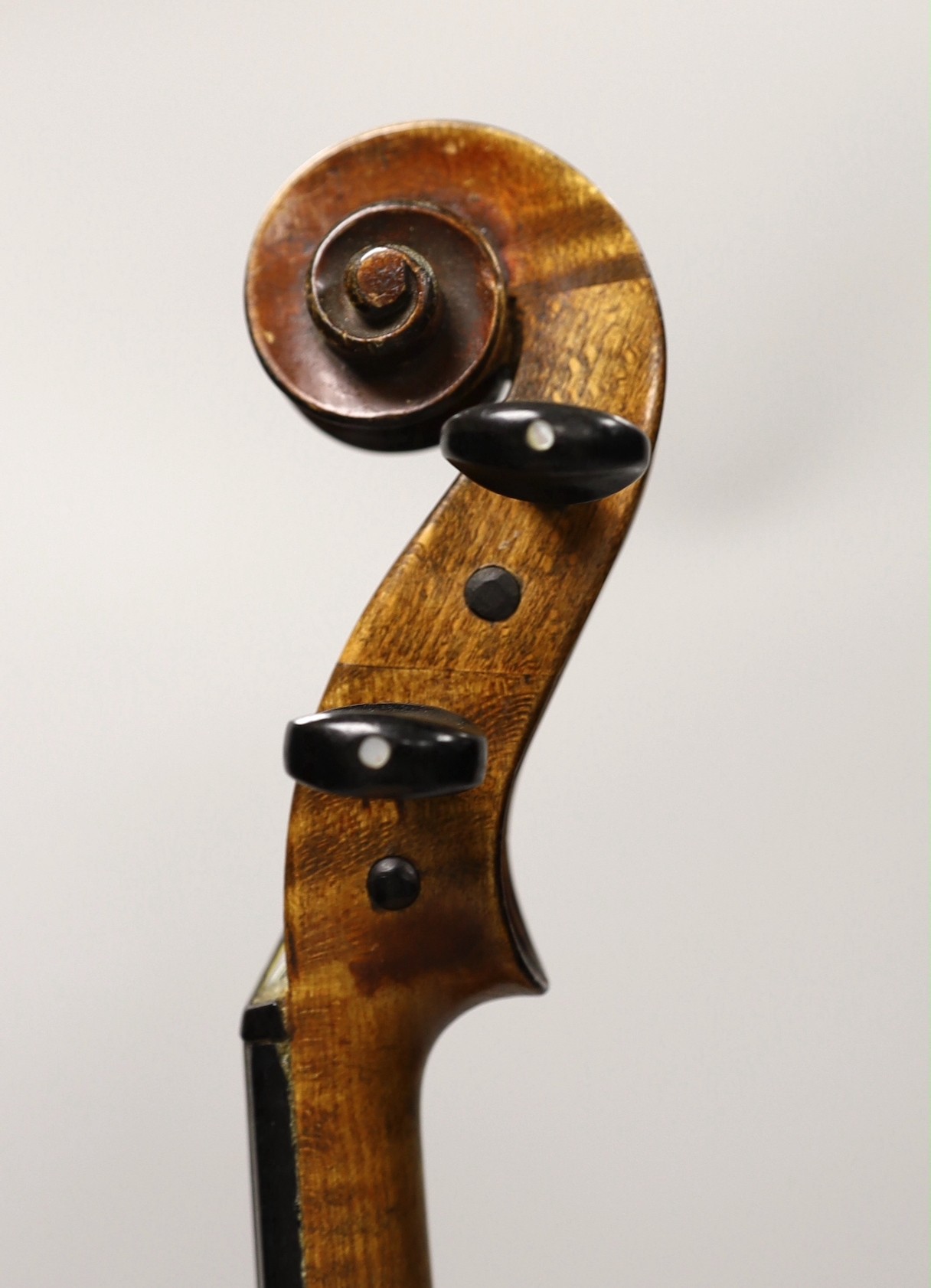 A cased French double backed violin, interior label reads ‘Copie de J.B. Vuillaume à Paris.’ Back measures 36cm excluding button